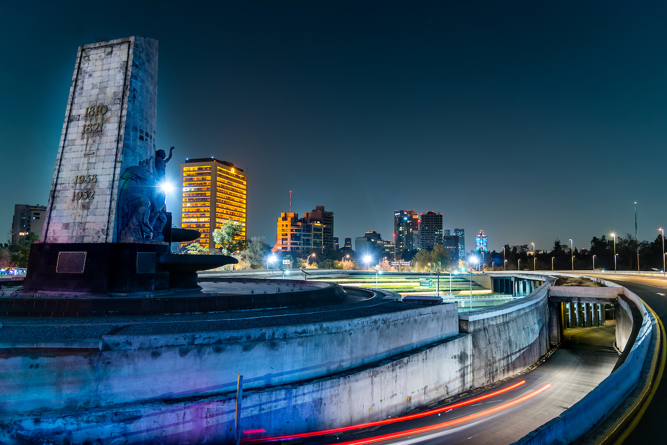 Mexico City Night landscape, petroleum fountain and periferico highway